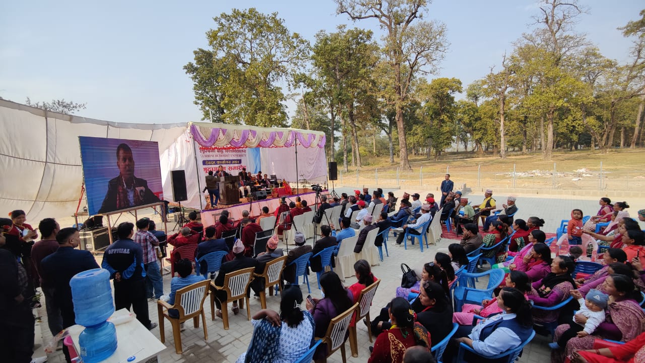 Outdoor public programme at Lumbini Buddhist University campus with audience Nepal