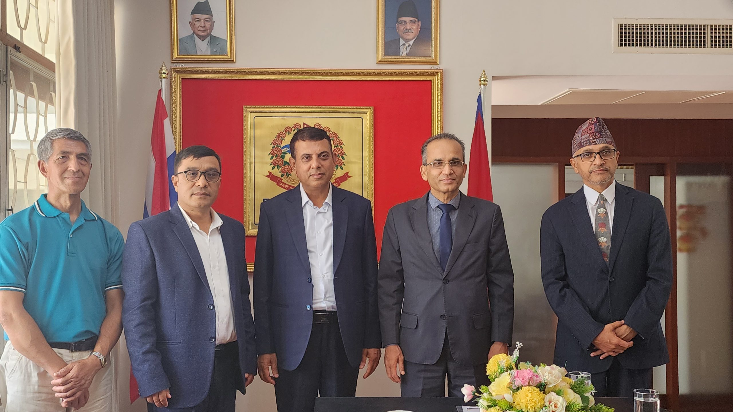 Dr. Tilak Ram Acharya with colleagues at Nepal Embassy official meeting April 25 2023