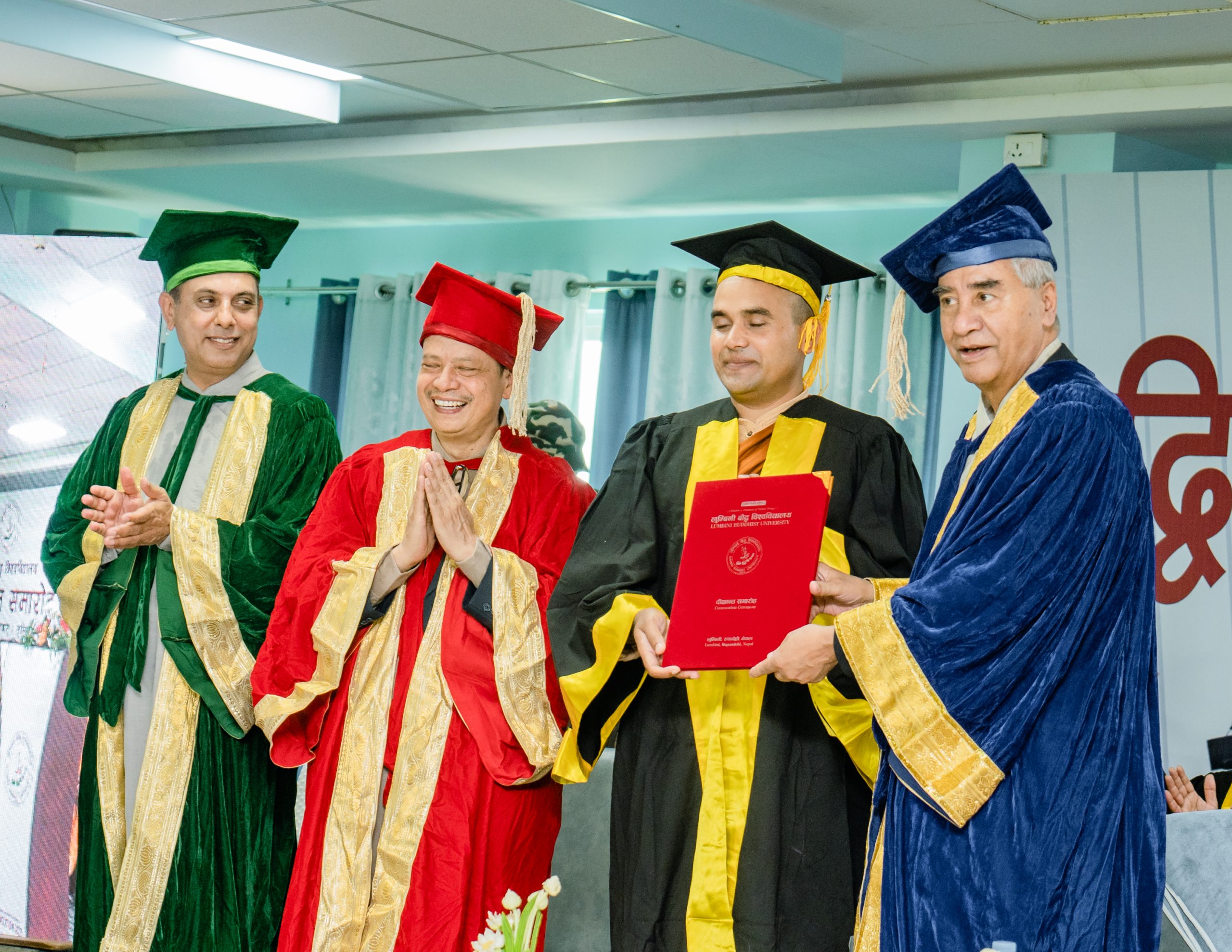 Graduates and faculty in regalia at Lumbini Buddhist University convocation ceremony Nepal