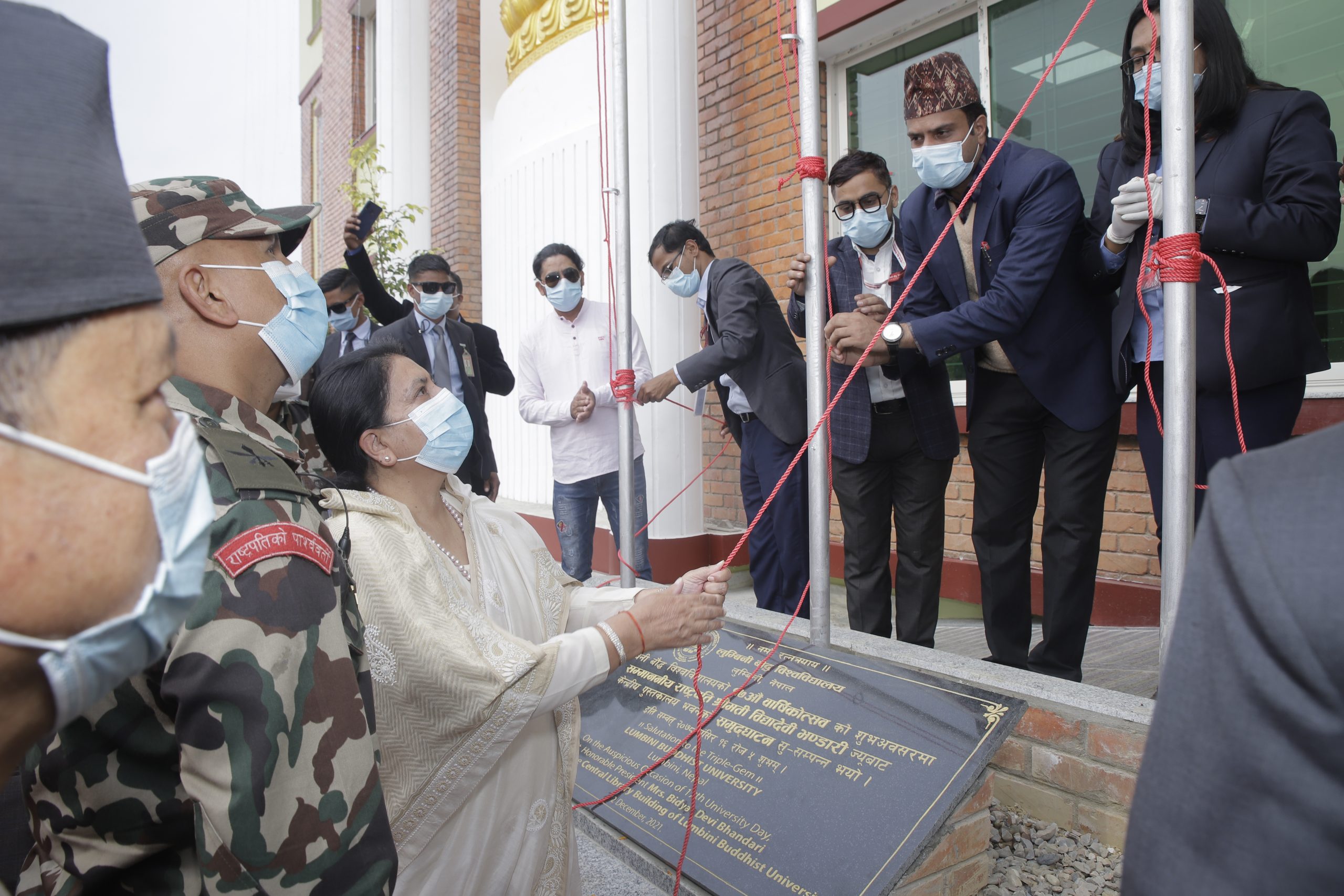 Inauguration ribbon cutting ceremony at new Lumbini Buddhist University building Nepal