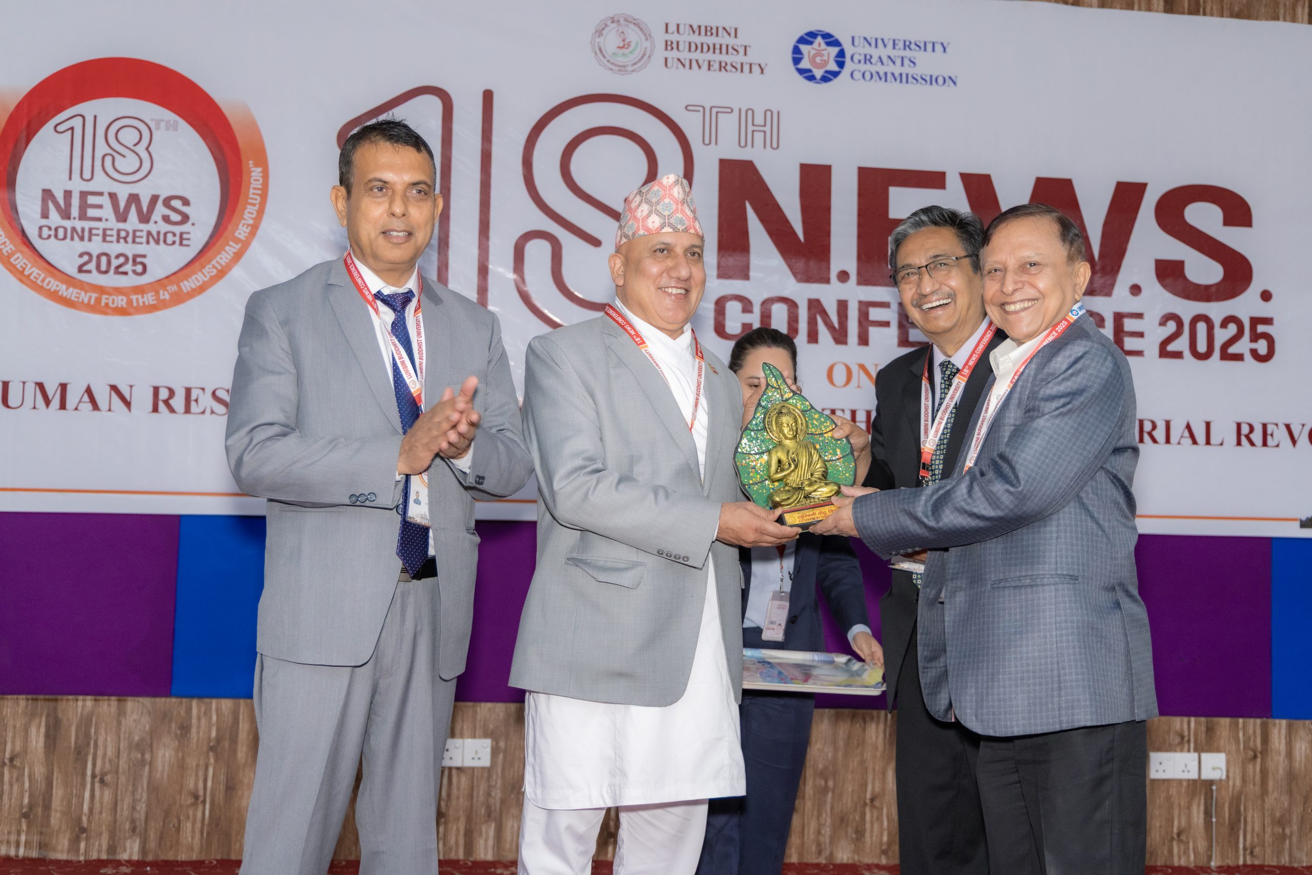 Buddha statue award presentation at 18th N.E.W.S. Conference 2025 Lumbini Buddhist University