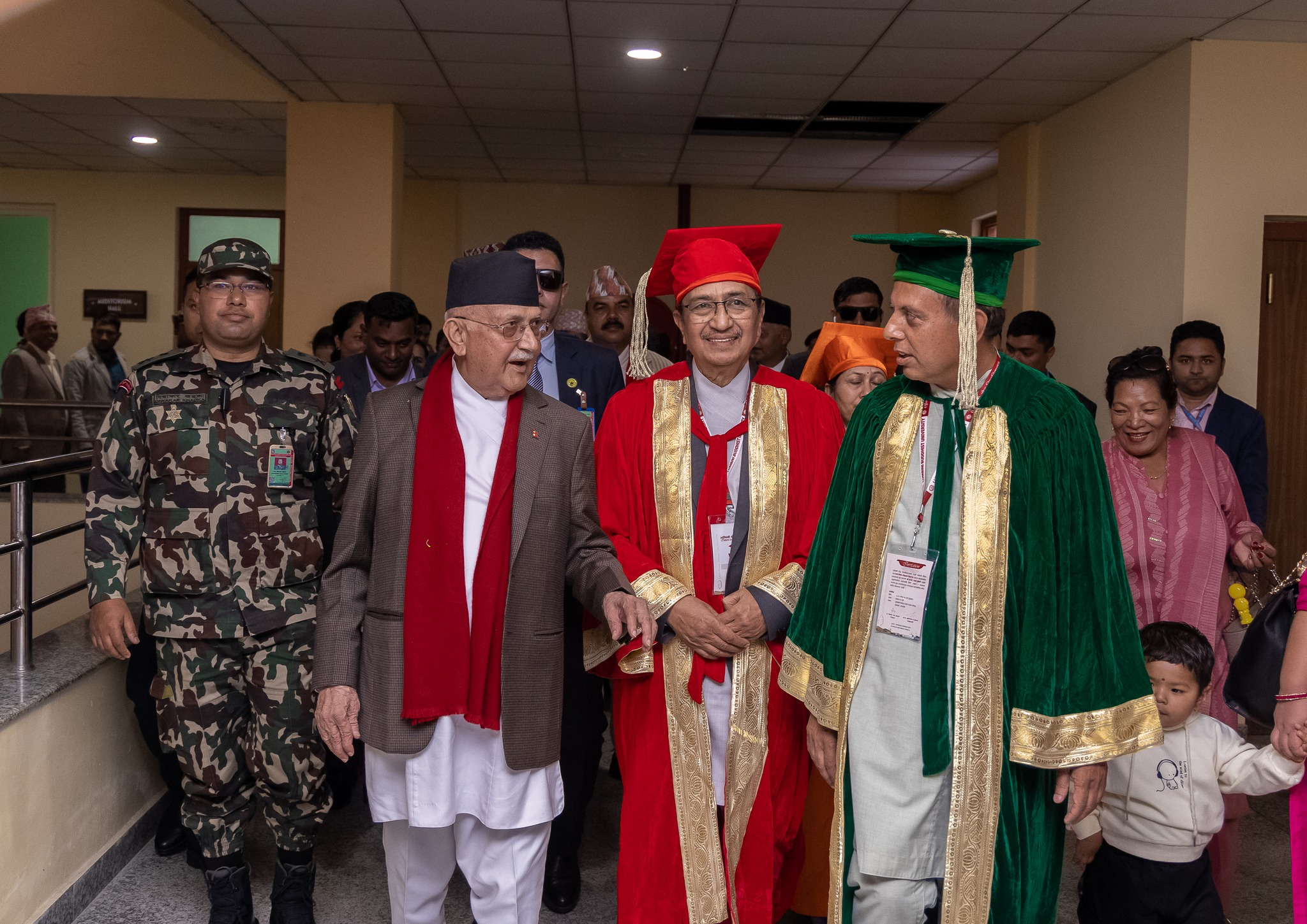Dr. Tilak Ram Acharya escorting PM KP Sharma Oli at Lumbini Buddhist University convocation