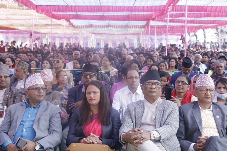Large public gathering at open-air event in Lumbini Province Nepal with thousands of attendees