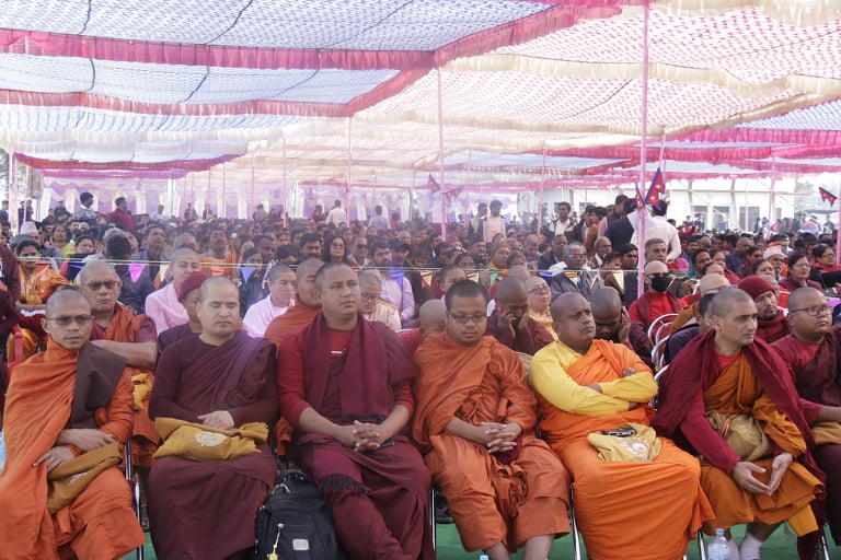 Crowd at public ceremony in Nepal attended by Lumbini Buddhist University officials
