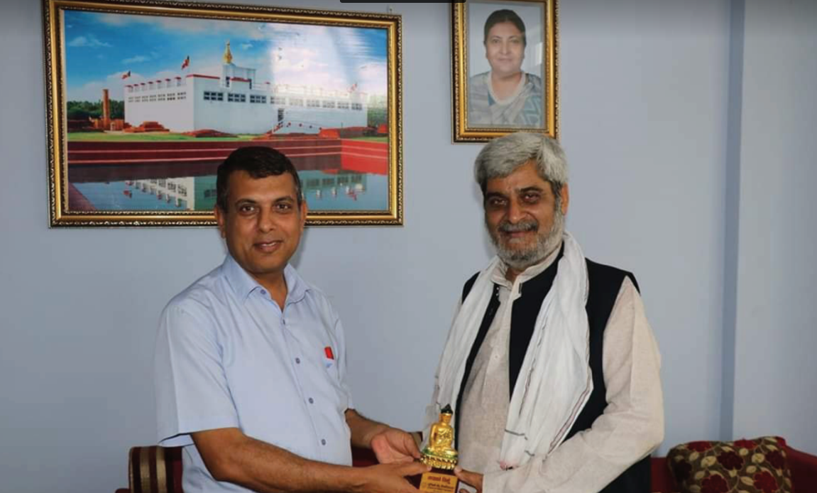 Ridesh Tripathi with Lumbini Buddhist University officials official meeting Nepal